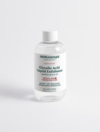 A bottle of Aromanesque Glycolic Acid Liquid Exfoliator against a white background.